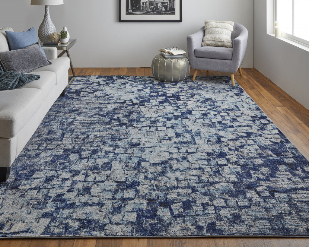 7' X 10' Blue And Ivory Abstract Power Loom Distressed Stain Resistant Area Rug