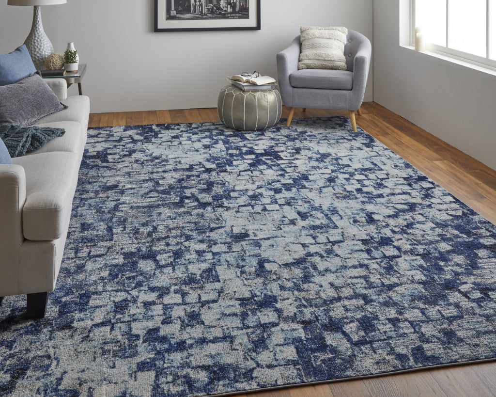 7' X 10' Blue And Ivory Abstract Power Loom Distressed Stain Resistant Area Rug