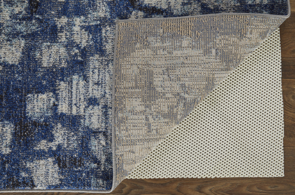 7' X 10' Blue And Ivory Abstract Power Loom Distressed Stain Resistant Area Rug