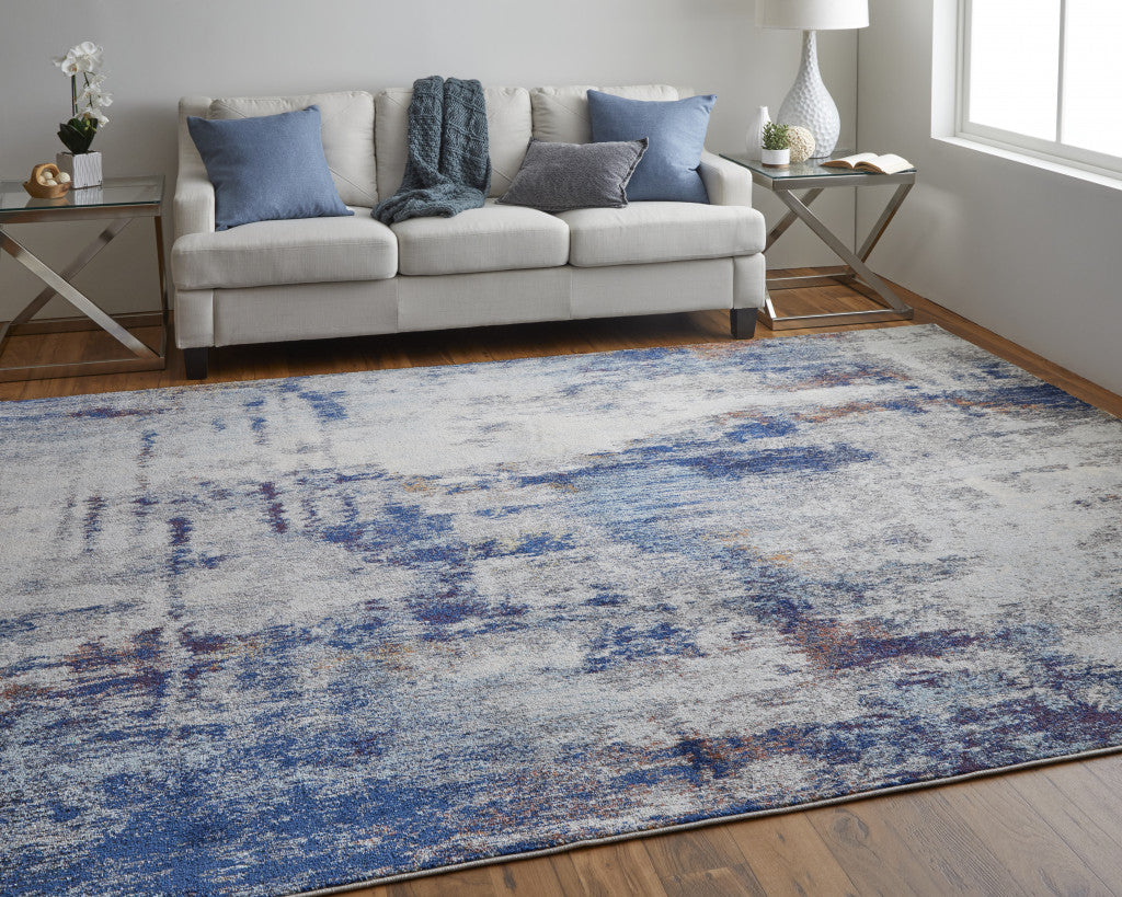 8' X 10' Ivory And Blue Abstract Power Loom Distressed Stain Resistant Area Rug