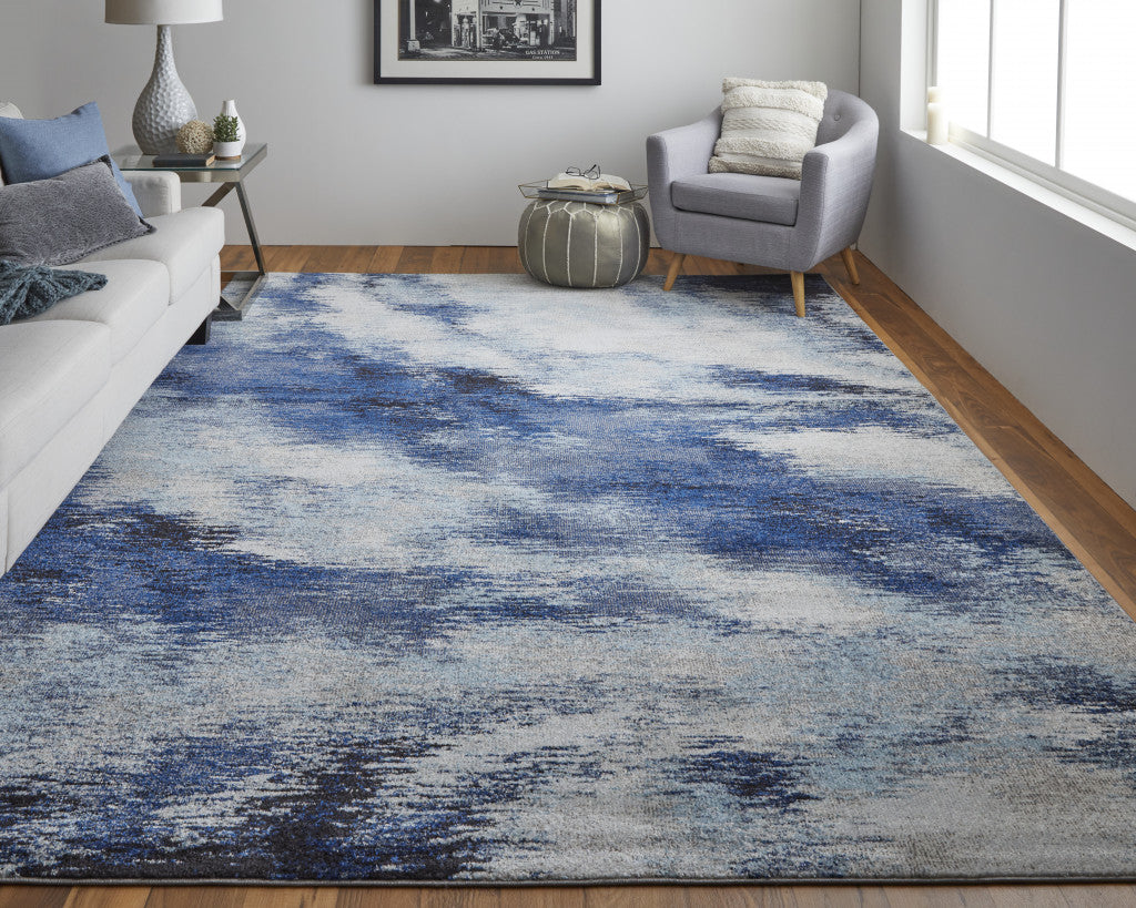 7' X 10' Blue And Ivory Abstract Power Loom Stain Resistant Area Rug