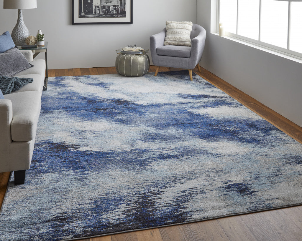 7' X 10' Blue And Ivory Abstract Power Loom Stain Resistant Area Rug