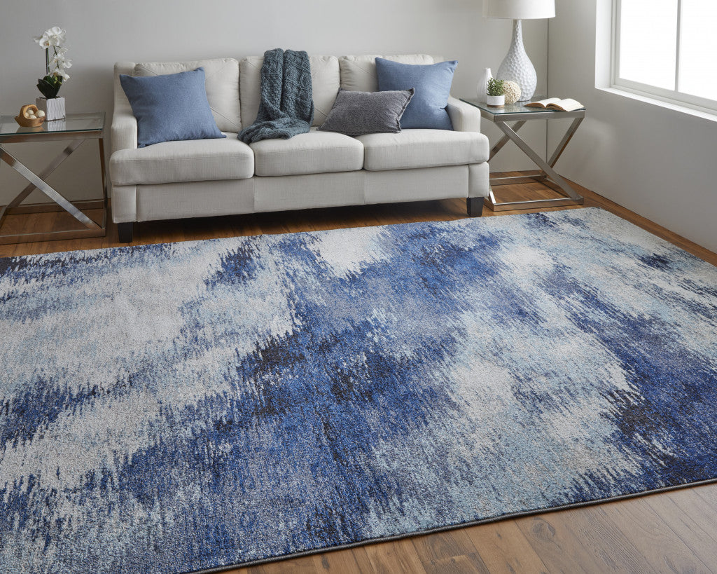 7' X 10' Blue And Ivory Abstract Power Loom Stain Resistant Area Rug