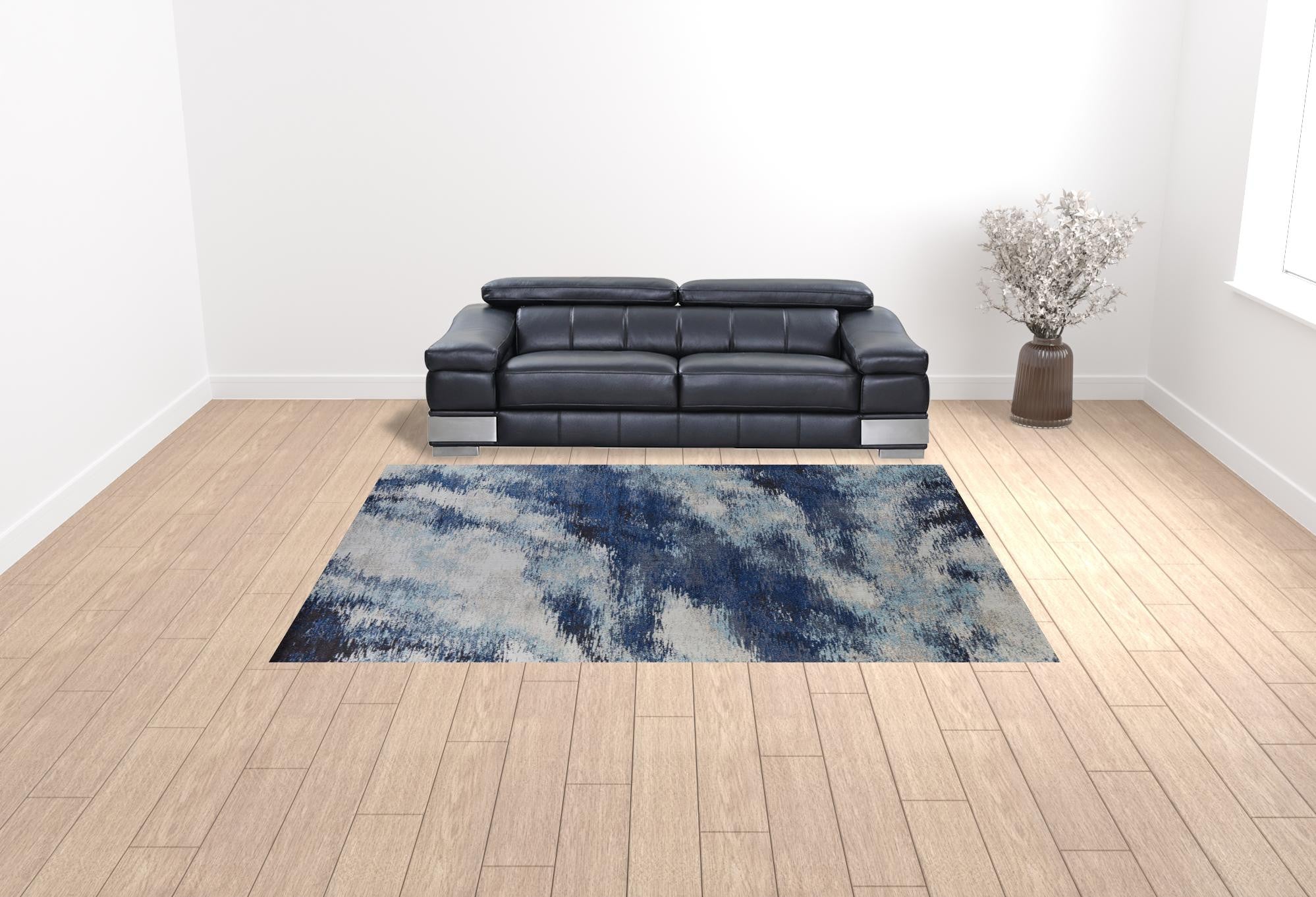 9' X 12' Blue And Ivory Abstract Power Loom Stain Resistant Area Rug