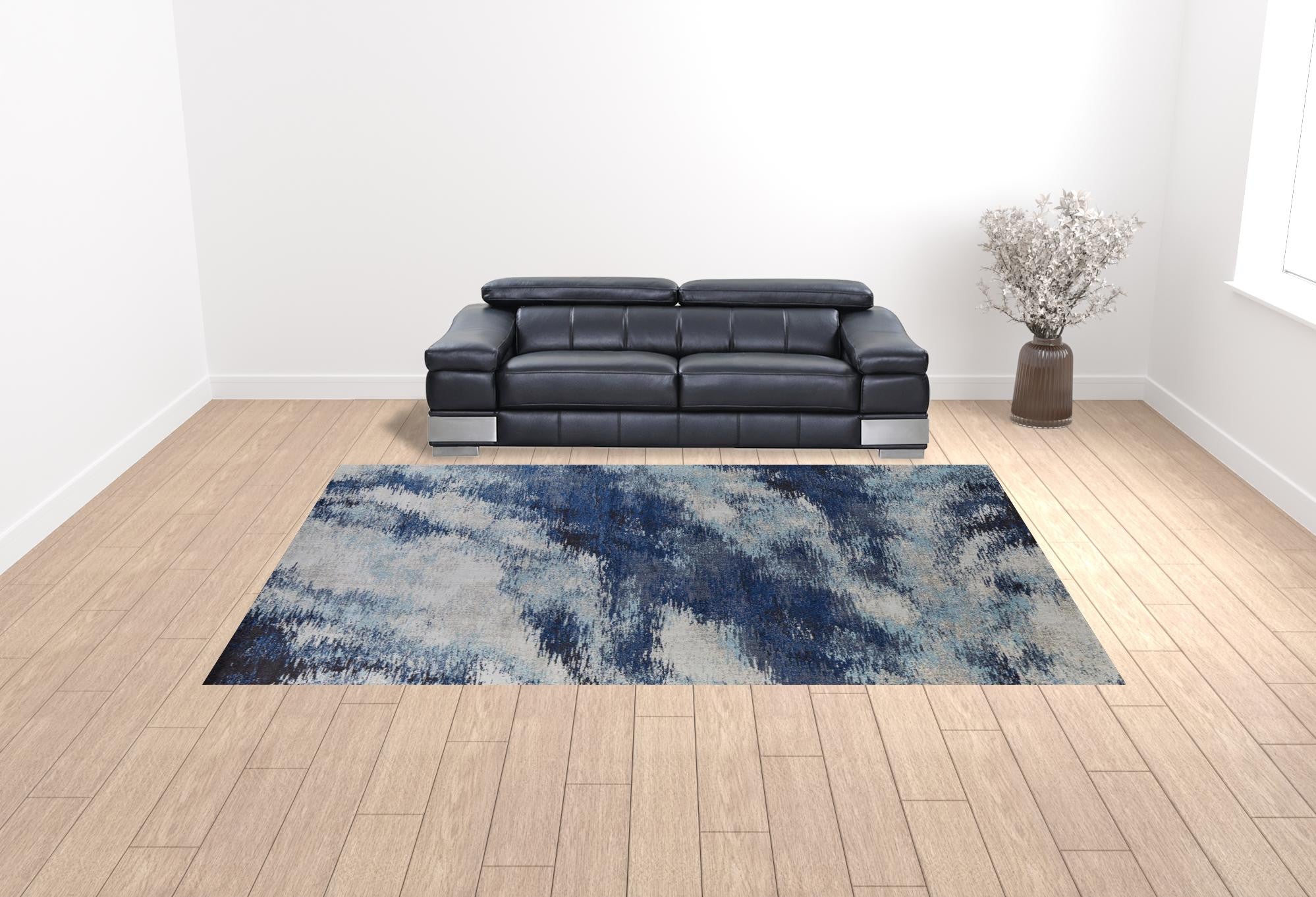 10' X 14' Blue And Ivory Abstract Power Loom Stain Resistant Area Rug