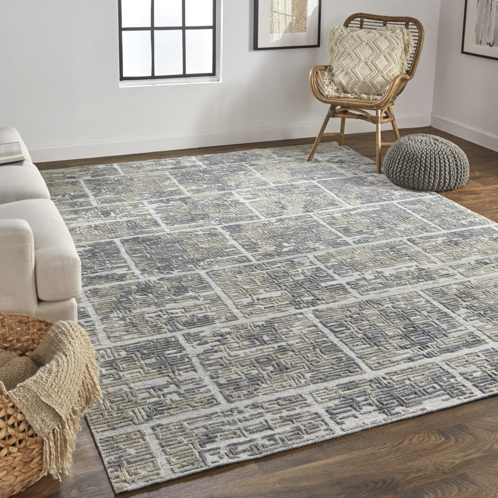 5' X 8' Gray And Ivory Abstract Hand Woven Area Rug