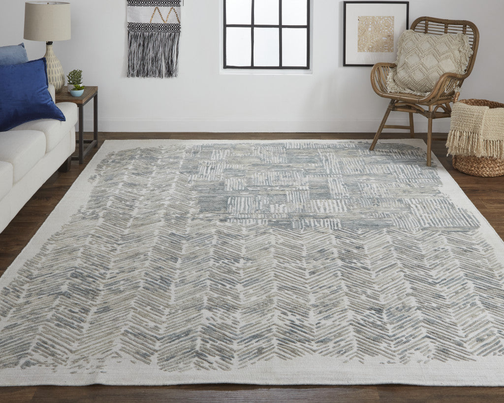 10' X 14' Green Blue And Ivory Abstract Hand Woven Area Rug