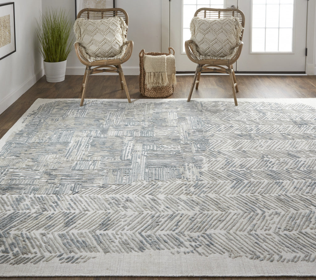 10' X 14' Green Blue And Ivory Abstract Hand Woven Area Rug