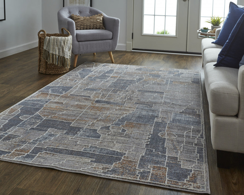 7' X 9' Blue Gray And Orange Geometric Power Loom Stain Resistant Area Rug