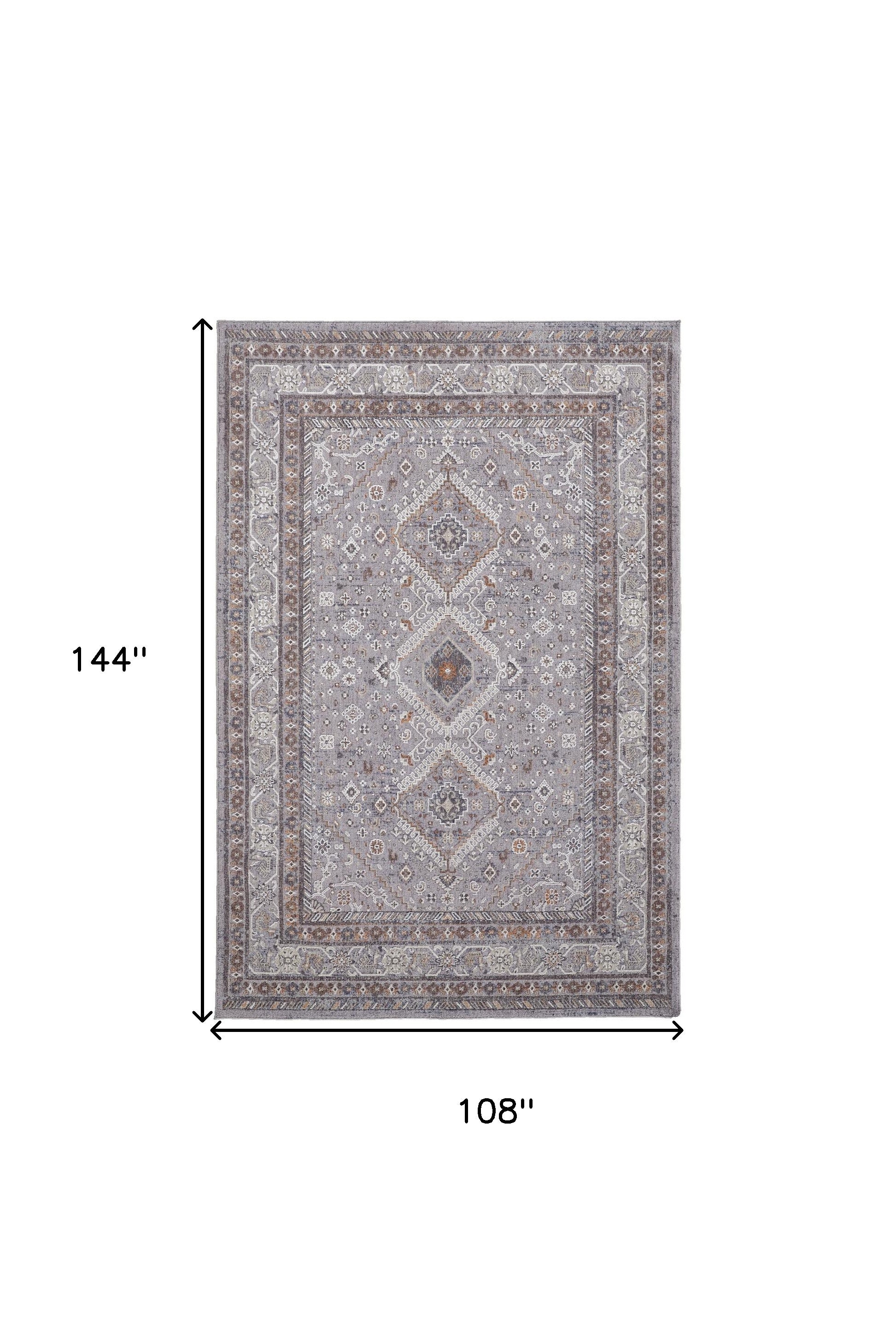 9' X 12' Gray Orange And Ivory Floral Power Loom Stain Resistant Area Rug