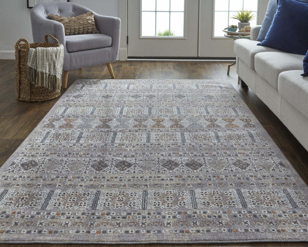 5' X 8' Orange Gray And White Geometric Power Loom Distressed Stain Resistant Area Rug