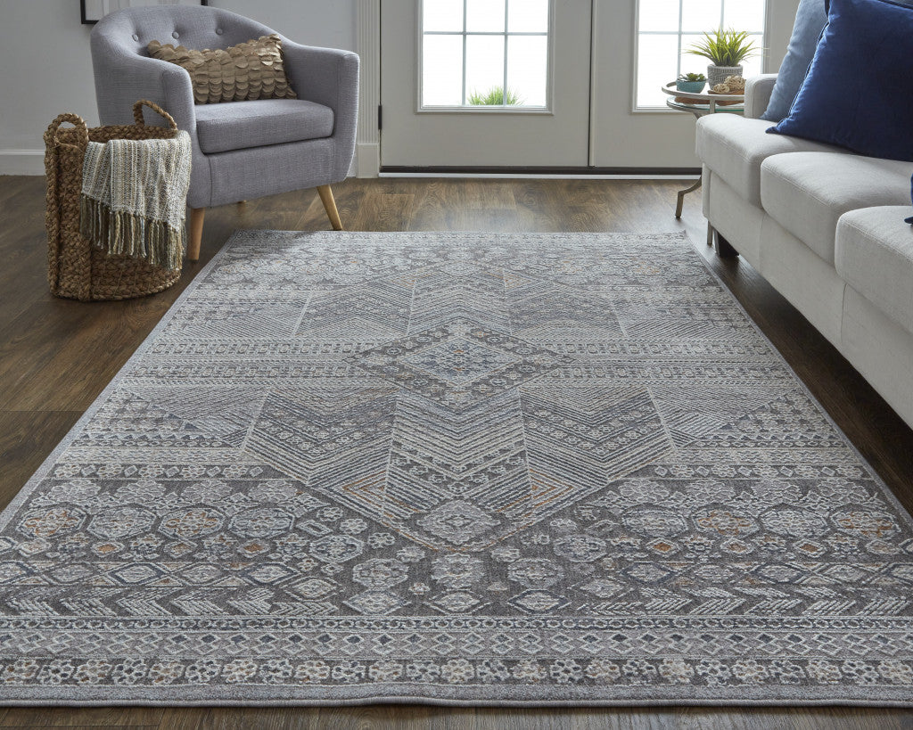 5' X 8' Ivory And Gray Geometric Power Loom Distressed Stain Resistant Area Rug