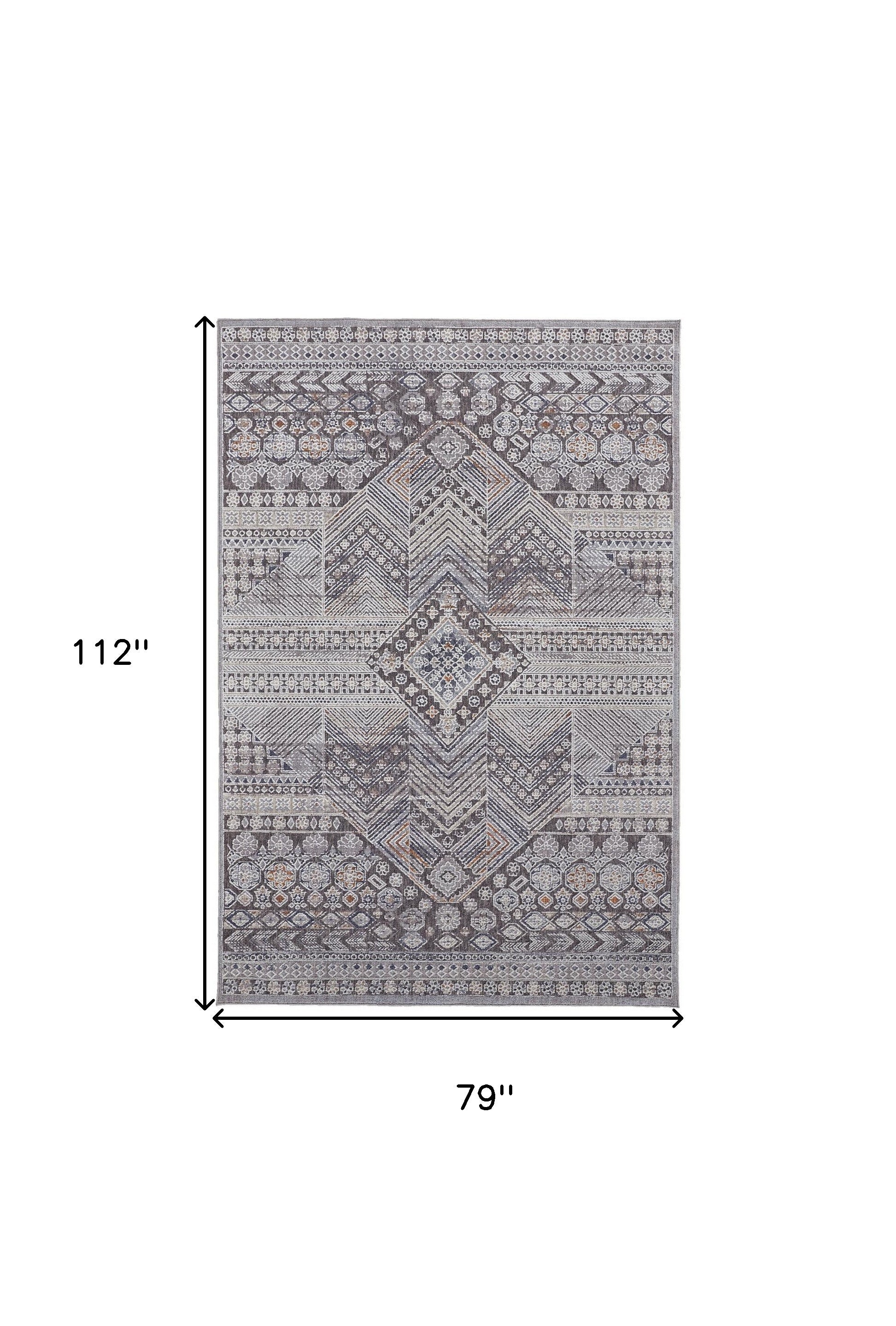 7' X 9' Ivory And Gray Geometric Power Loom Distressed Stain Resistant Area Rug