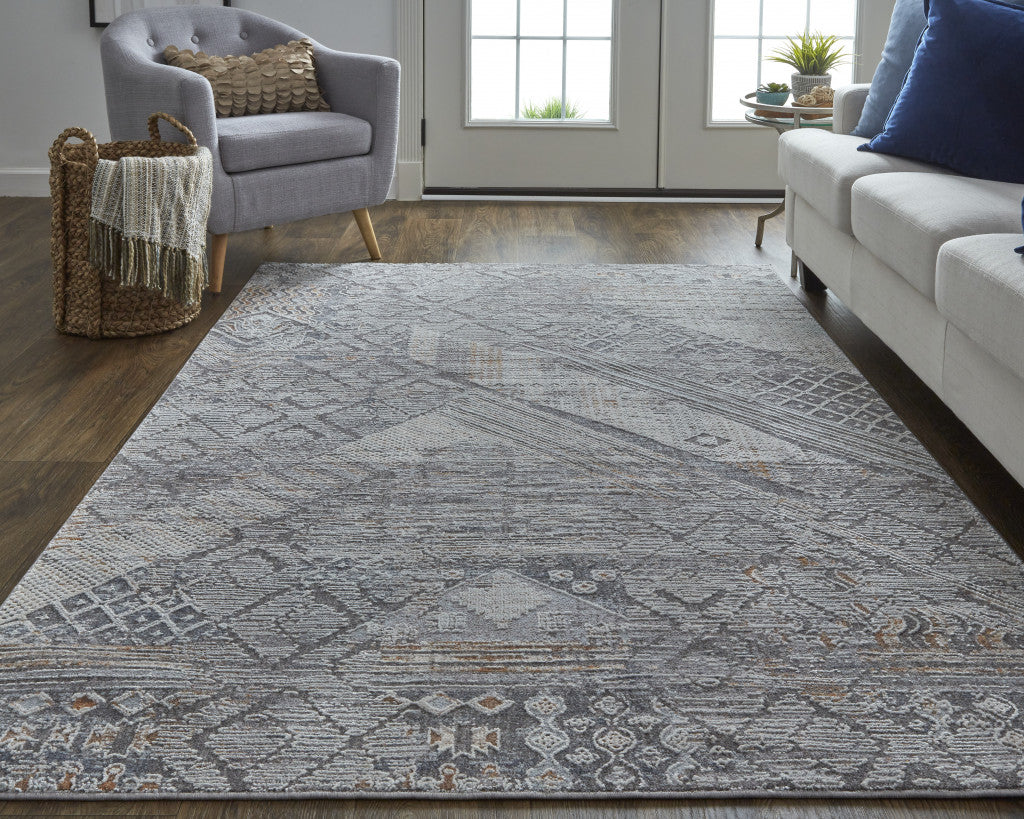 5' X 8' Ivory And Gray Geometric Power Loom Distressed Stain Resistant Area Rug