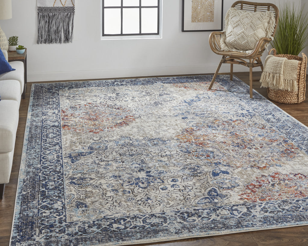 8' X 11' Blue Ivory And Red Floral Power Loom Distressed Stain Resistant Area Rug