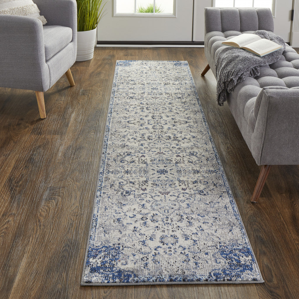 10' Ivory Gray And Blue Floral Power Loom Distressed Stain Resistant Runner Rug