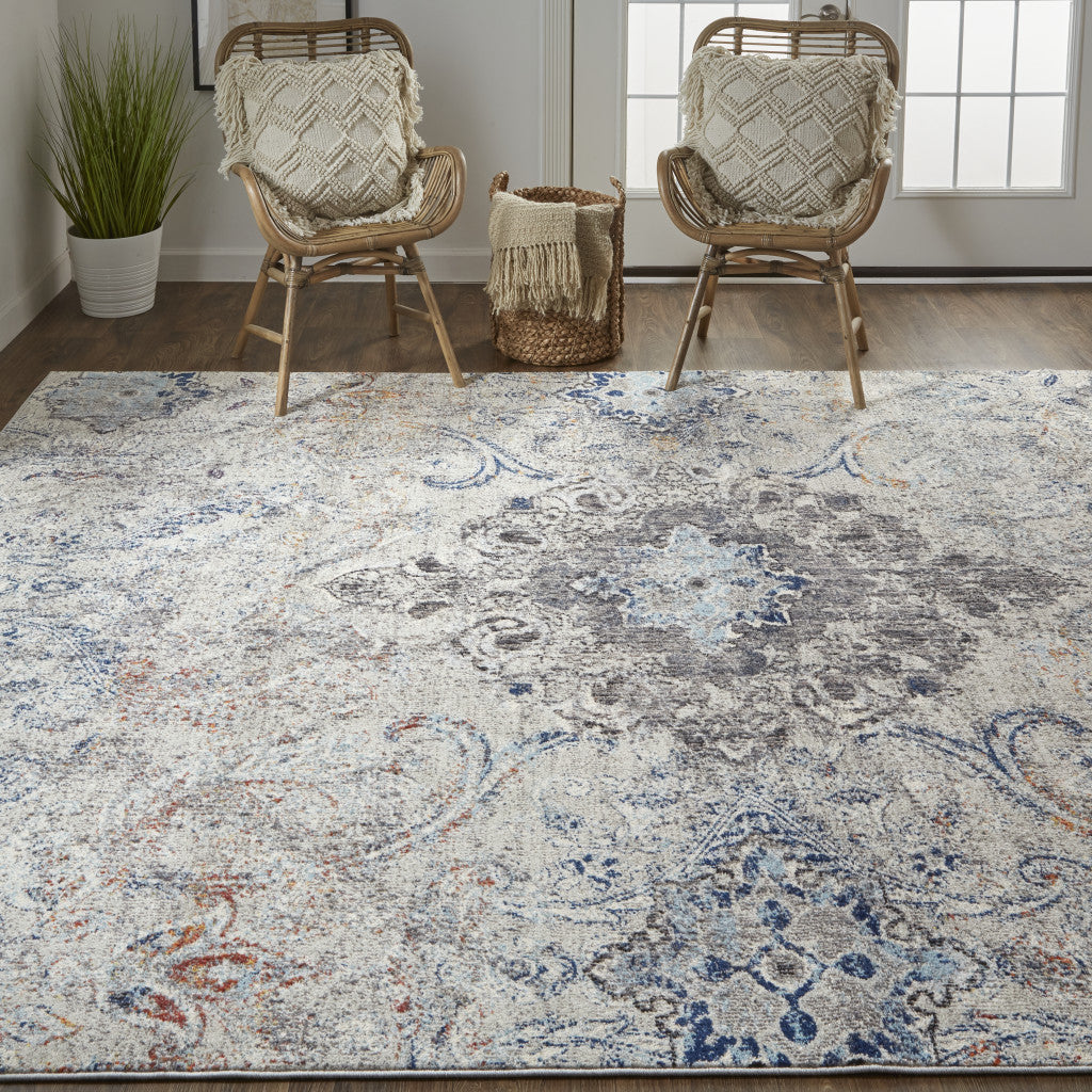 8' X 11' Ivory Taupe And Blue Floral Power Loom Distressed Stain Resistant Area Rug