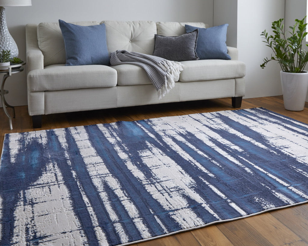 4' X 6' Ivory Blue And Gray Abstract Power Loom Distressed Area Rug