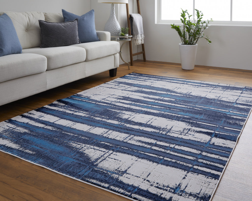 4' X 6' Ivory Blue And Gray Abstract Power Loom Distressed Area Rug