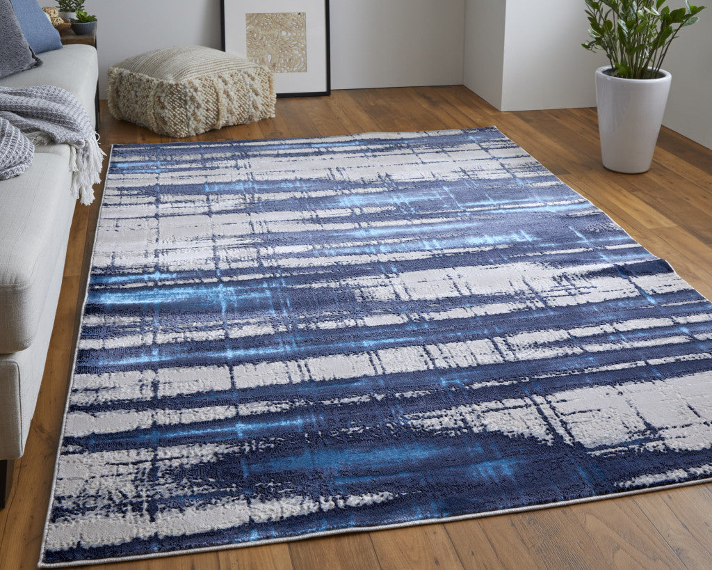 5' X 8' Ivory Blue And Gray Abstract Power Loom Distressed Area Rug