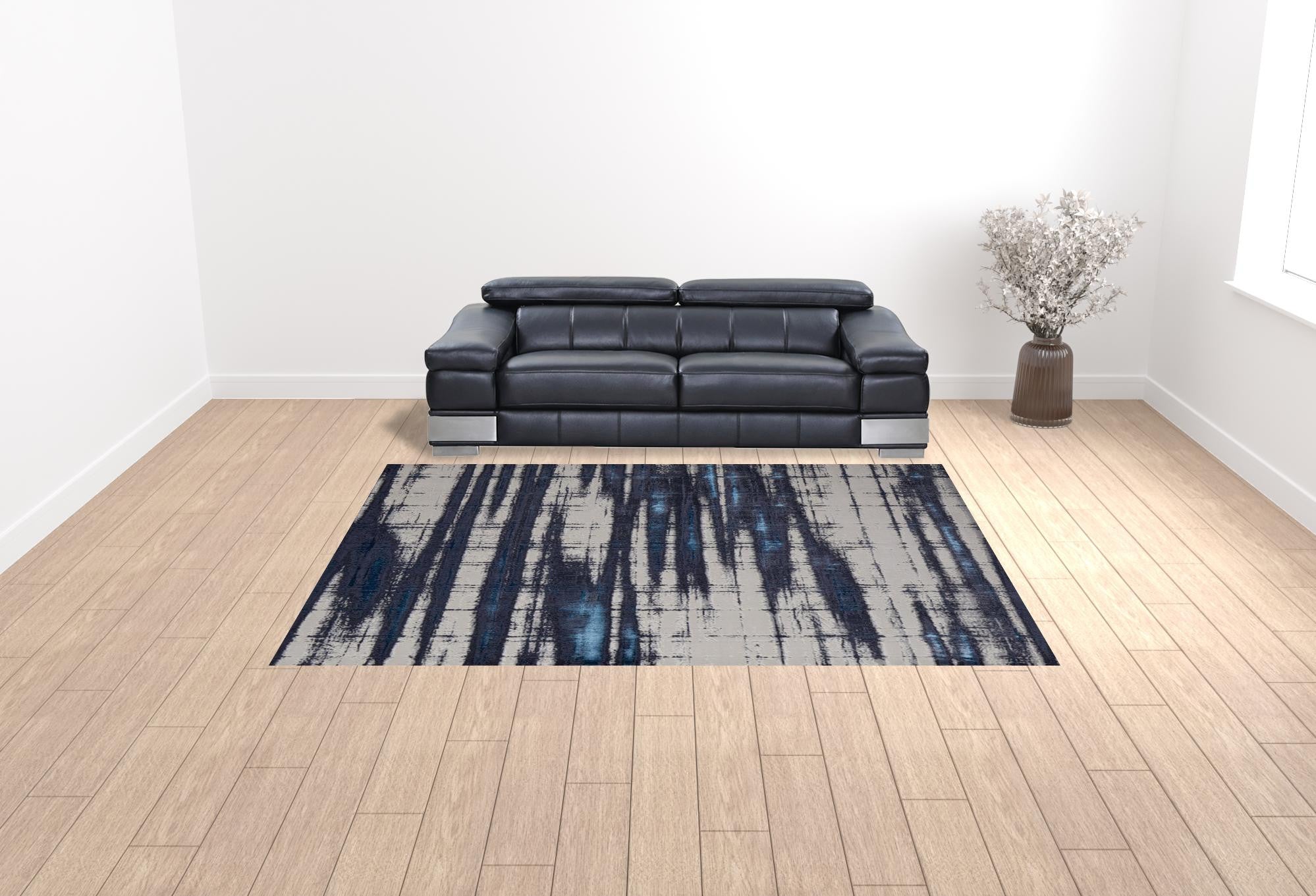 9' X 12' Ivory Blue And Gray Abstract Power Loom Distressed Area Rug