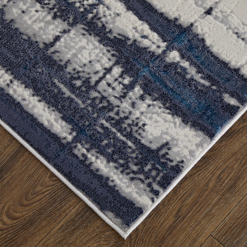 10' X 13' Ivory Blue And Gray Abstract Power Loom Distressed Area Rug