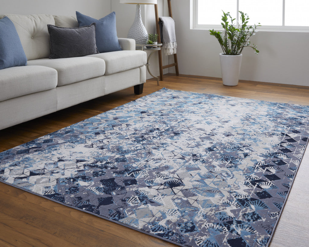 7' X 10' Blue Ivory And Gray Geometric Power Loom Distressed Area Rug