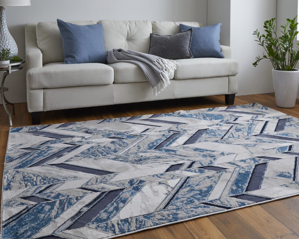 8' X 10' Ivory Blue And Gray Chevron Power Loom Distressed Area Rug