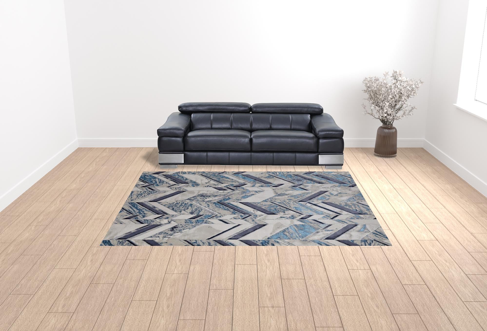 9' X 12' Ivory Blue And Gray Chevron Power Loom Distressed Area Rug