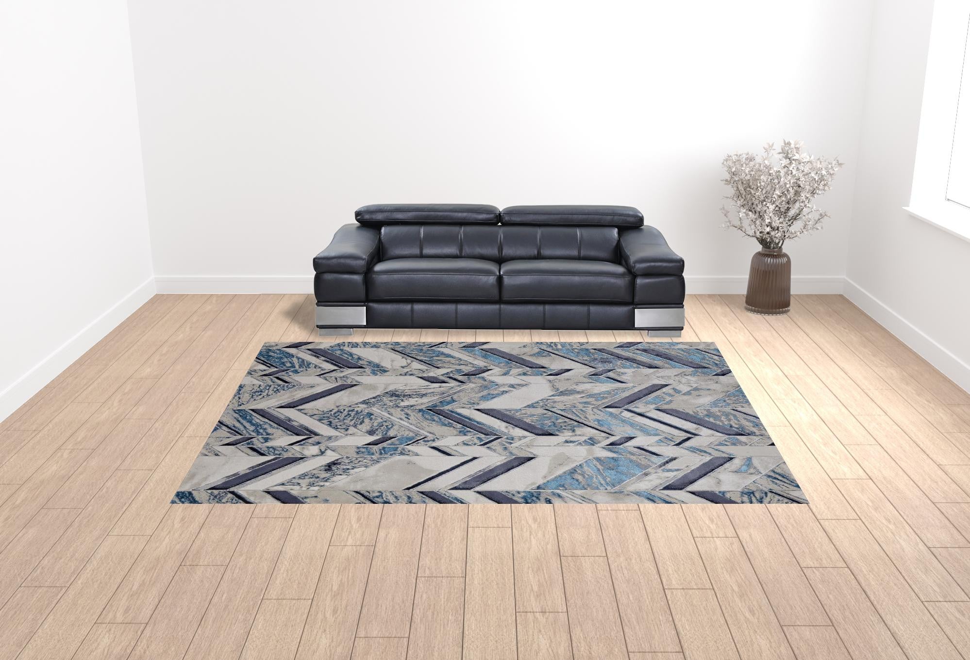 10' X 13' Ivory Blue And Gray Chevron Power Loom Distressed Area Rug