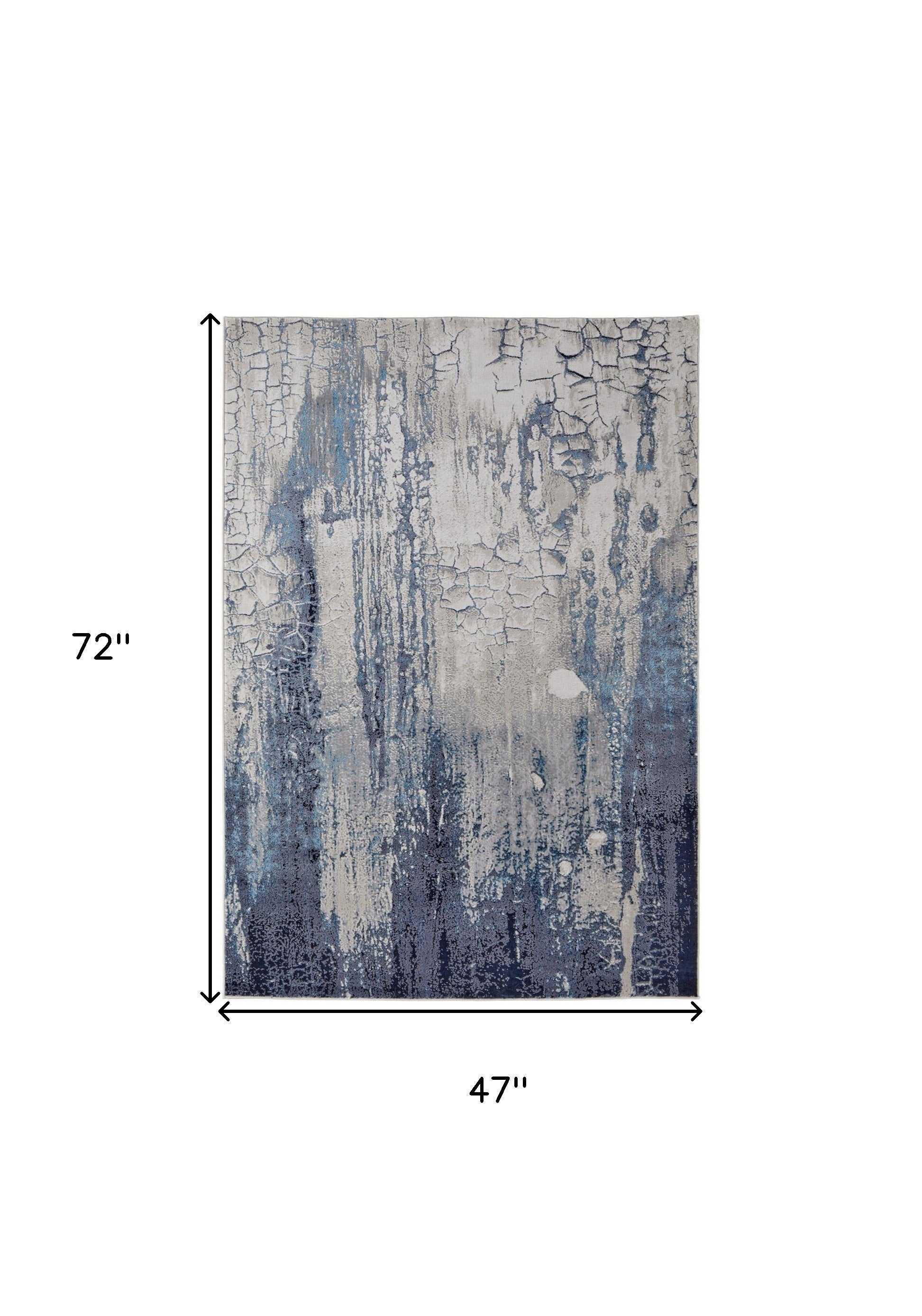 4' X 6' Ivory Blue And Black Abstract Power Loom Distressed Area Rug