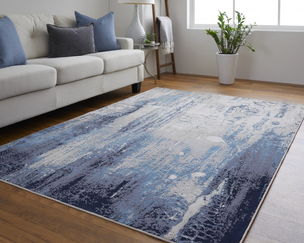 4' X 6' Ivory Blue And Black Abstract Power Loom Distressed Area Rug