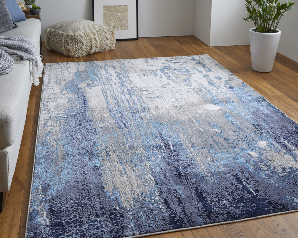 4' X 6' Ivory Blue And Black Abstract Power Loom Distressed Area Rug