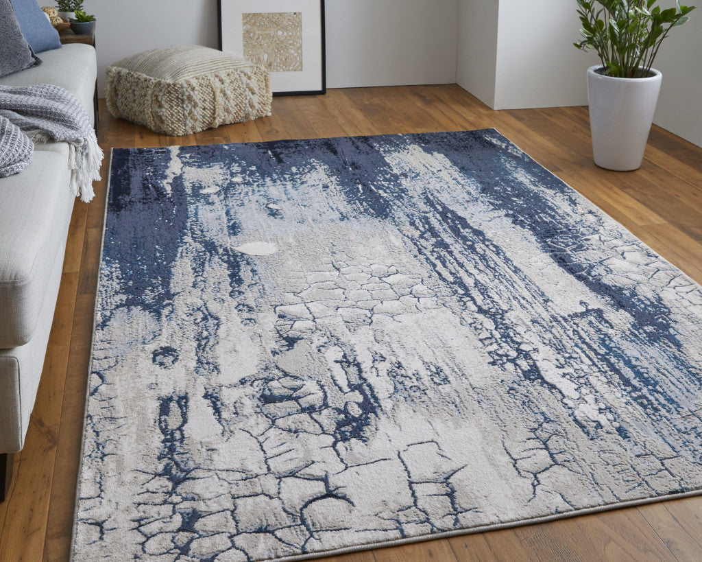 5' X 8' Ivory Blue And Black Abstract Power Loom Distressed Area Rug