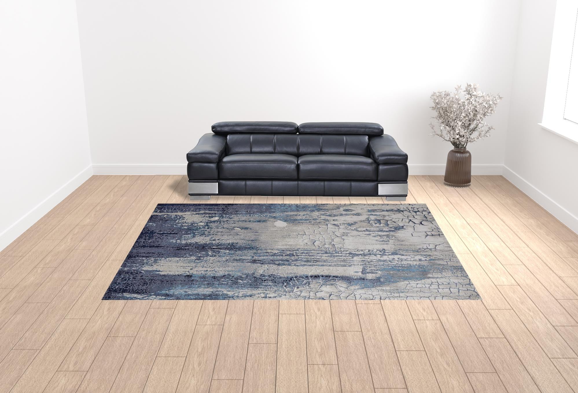 10' X 13' Ivory Blue And Black Abstract Power Loom Distressed Area Rug