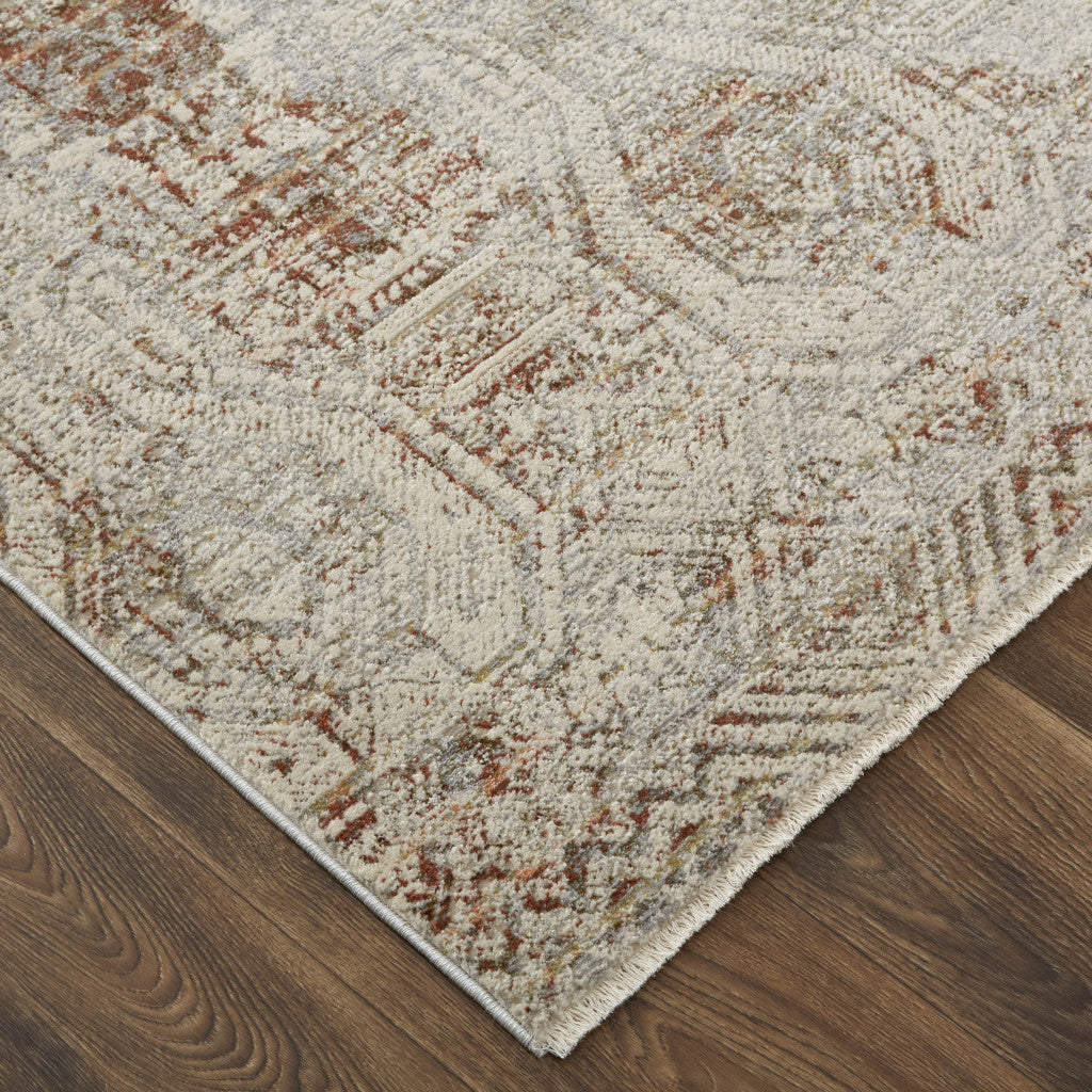 10' X 13' Tan Ivory And Orange Floral Power Loom Distressed Area Rug With Fringe