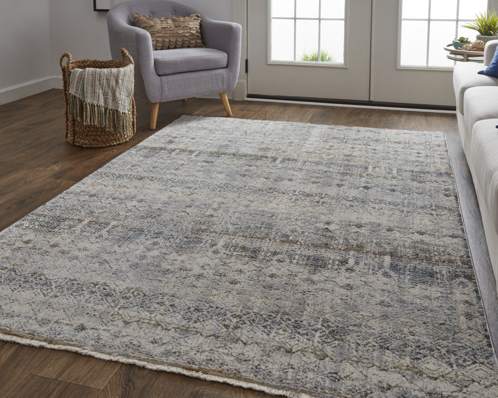 8' X 10' Tan Ivory And Blue Geometric Power Loom Distressed Area Rug With Fringe