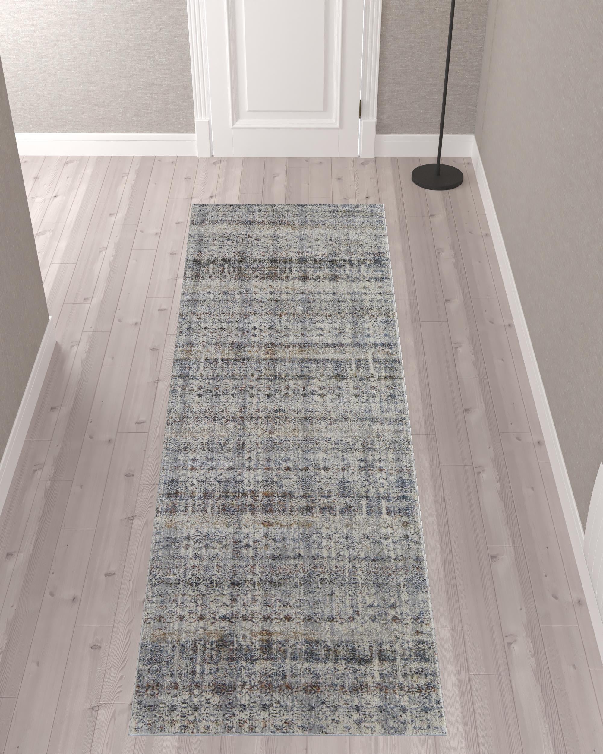 10' Tan Ivory And Blue Geometric Power Loom Distressed Runner Rug With Fringe