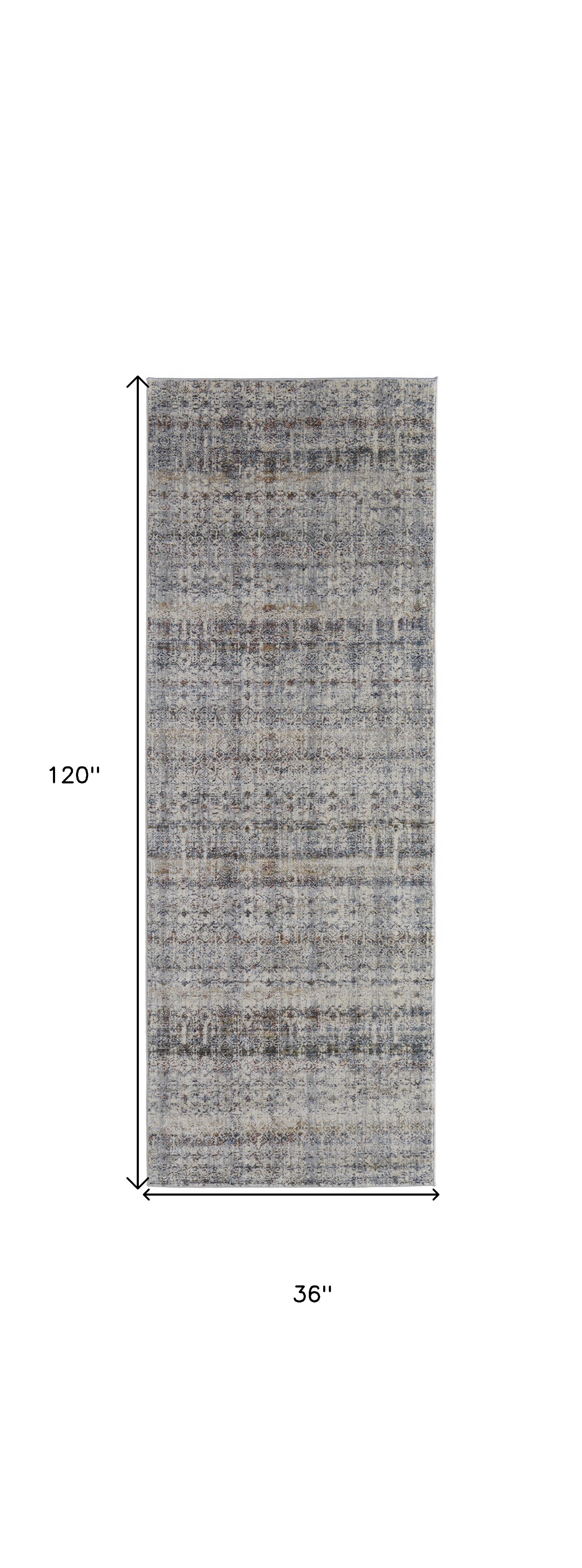 10' Tan Ivory And Blue Geometric Power Loom Distressed Runner Rug With Fringe