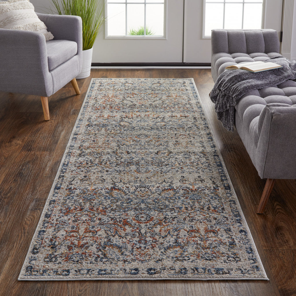 10' Tan Blue And Orange Floral Power Loom Distressed Runner Rug With Fringe