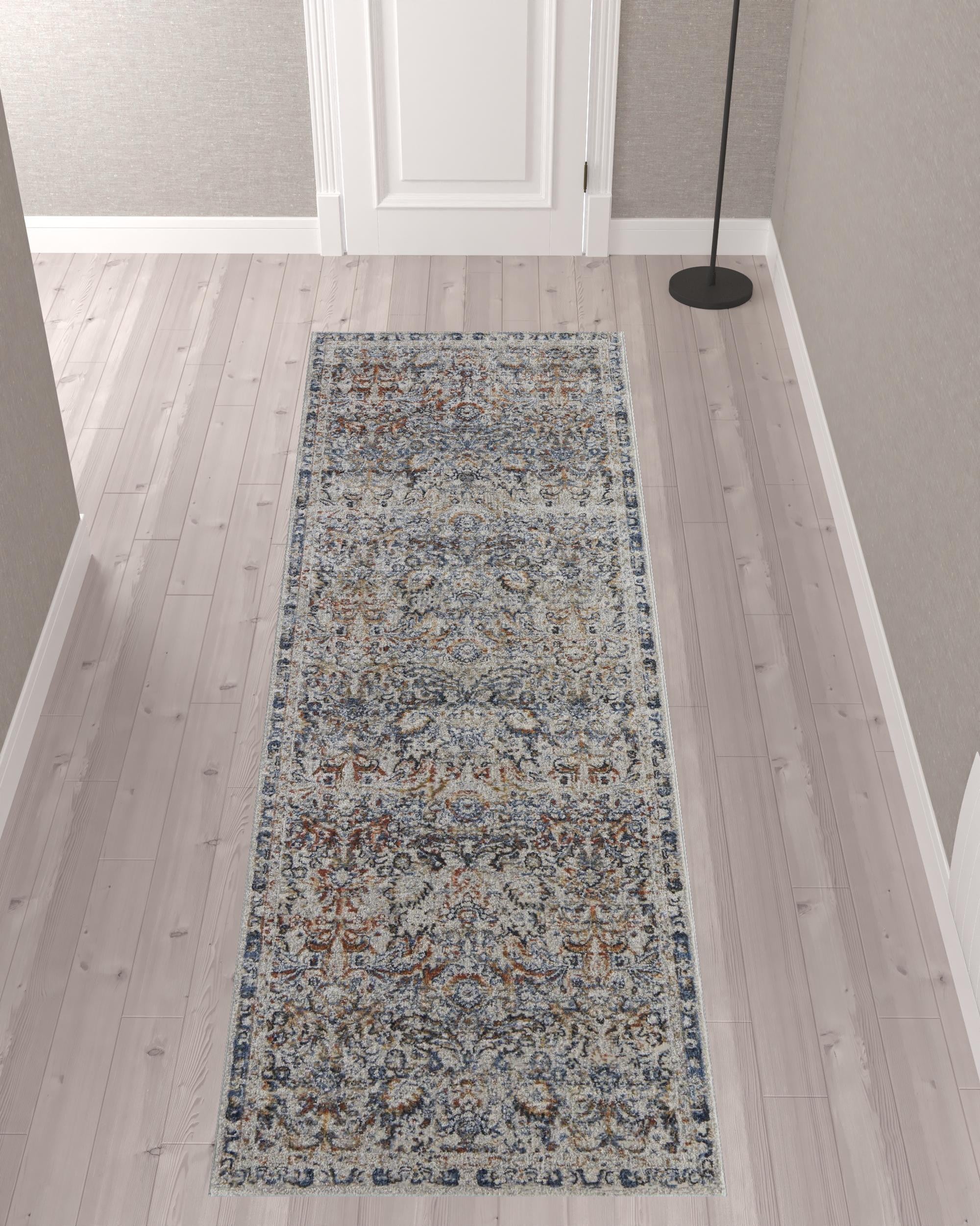 10' Tan Blue And Orange Floral Power Loom Distressed Runner Rug With Fringe