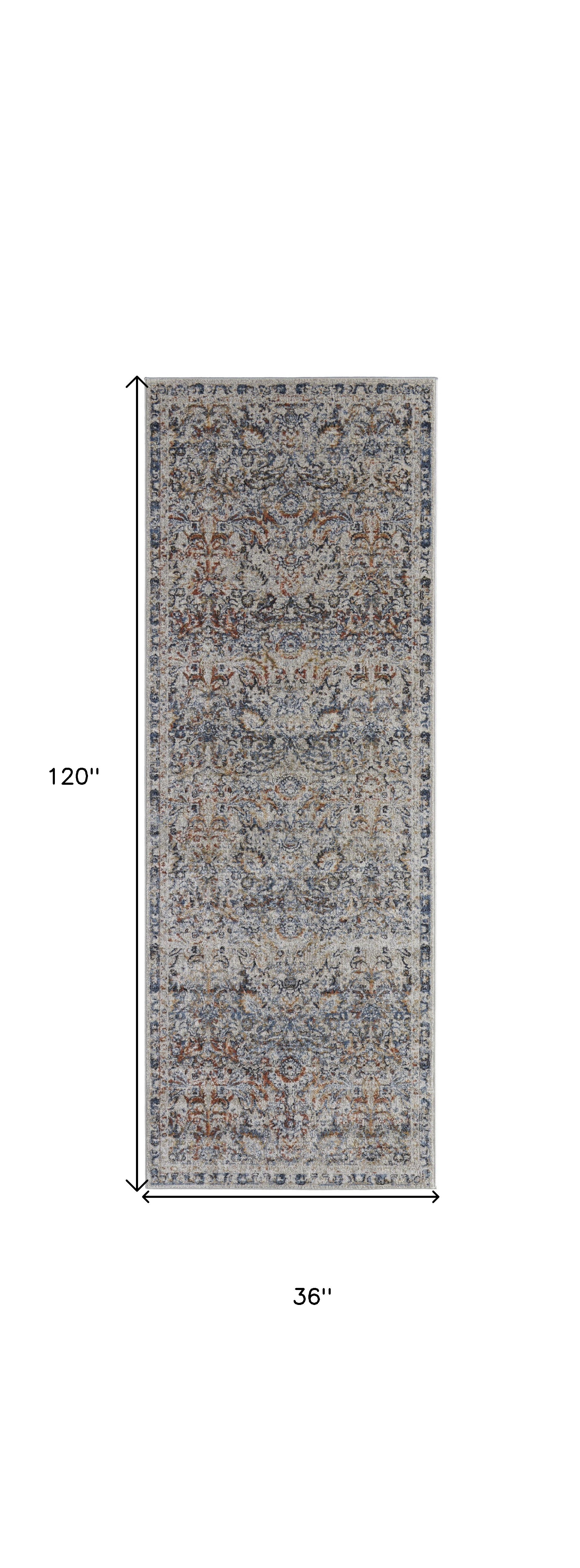 10' Tan Blue And Orange Floral Power Loom Distressed Runner Rug With Fringe