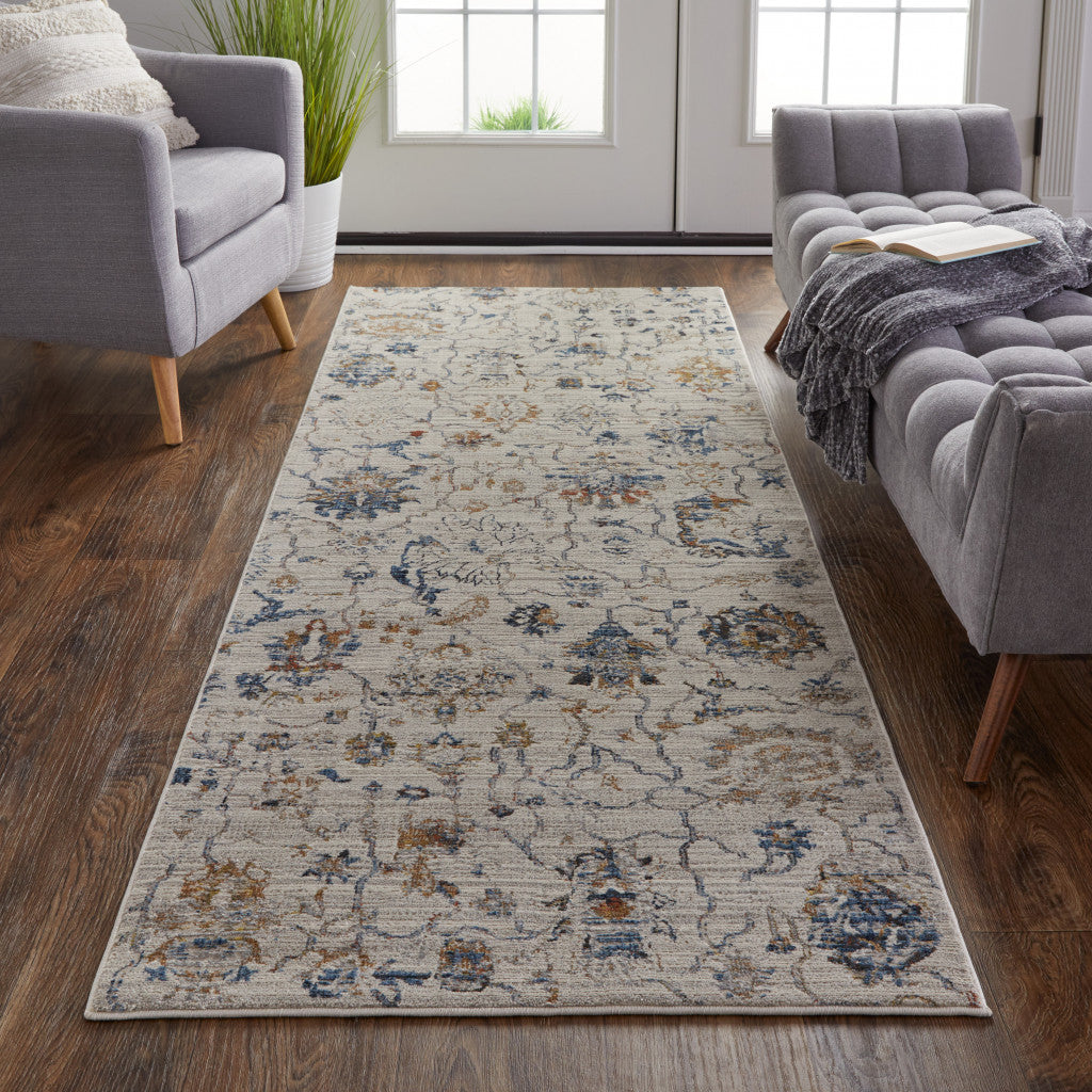 10' Ivory Orange And Blue Floral Power Loom Distressed Runner Rug With Fringe