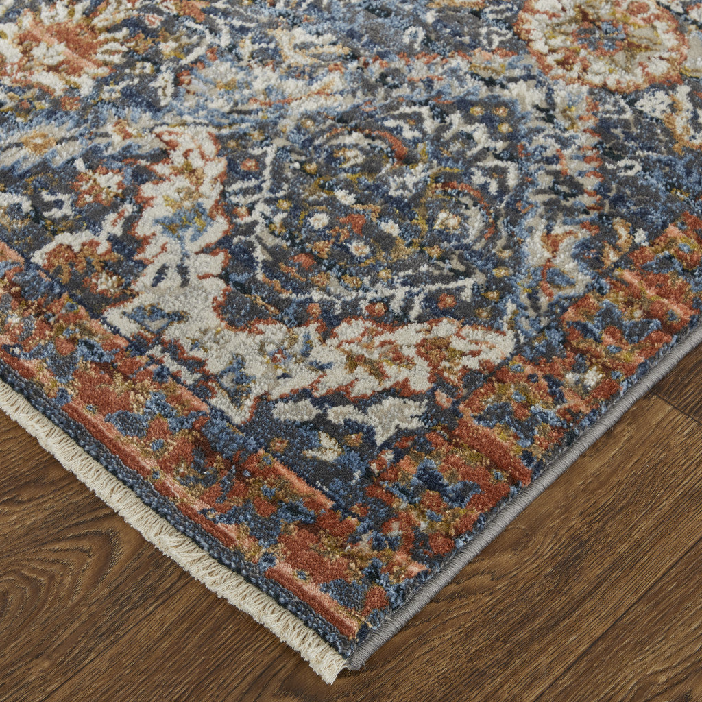 5' X 8' Blue Orange And Ivory Floral Power Loom Area Rug With Fringe