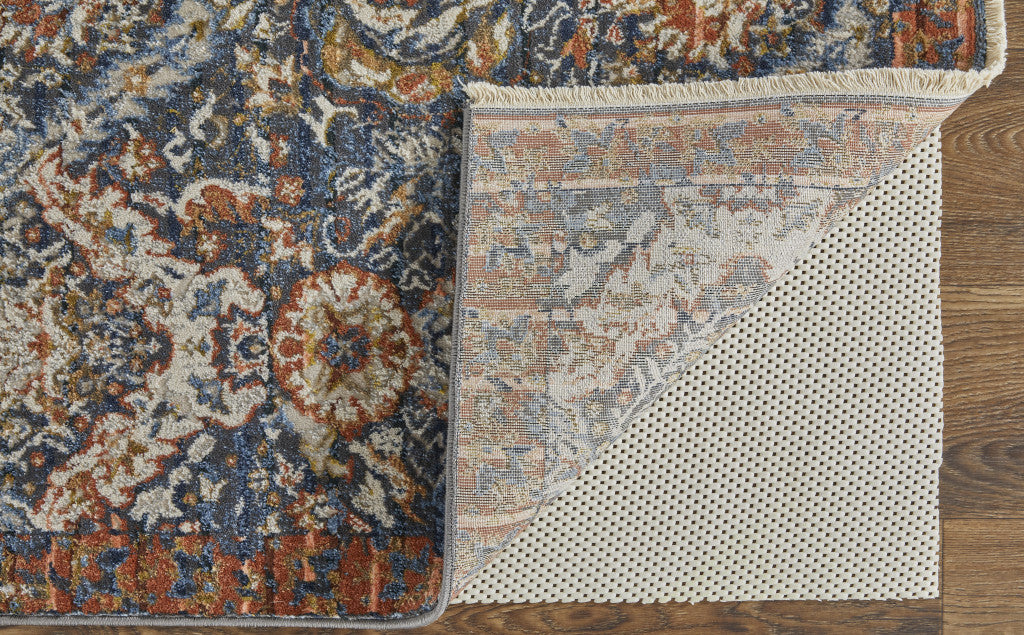 10' X 13' Blue Orange And Ivory Floral Power Loom Area Rug With Fringe