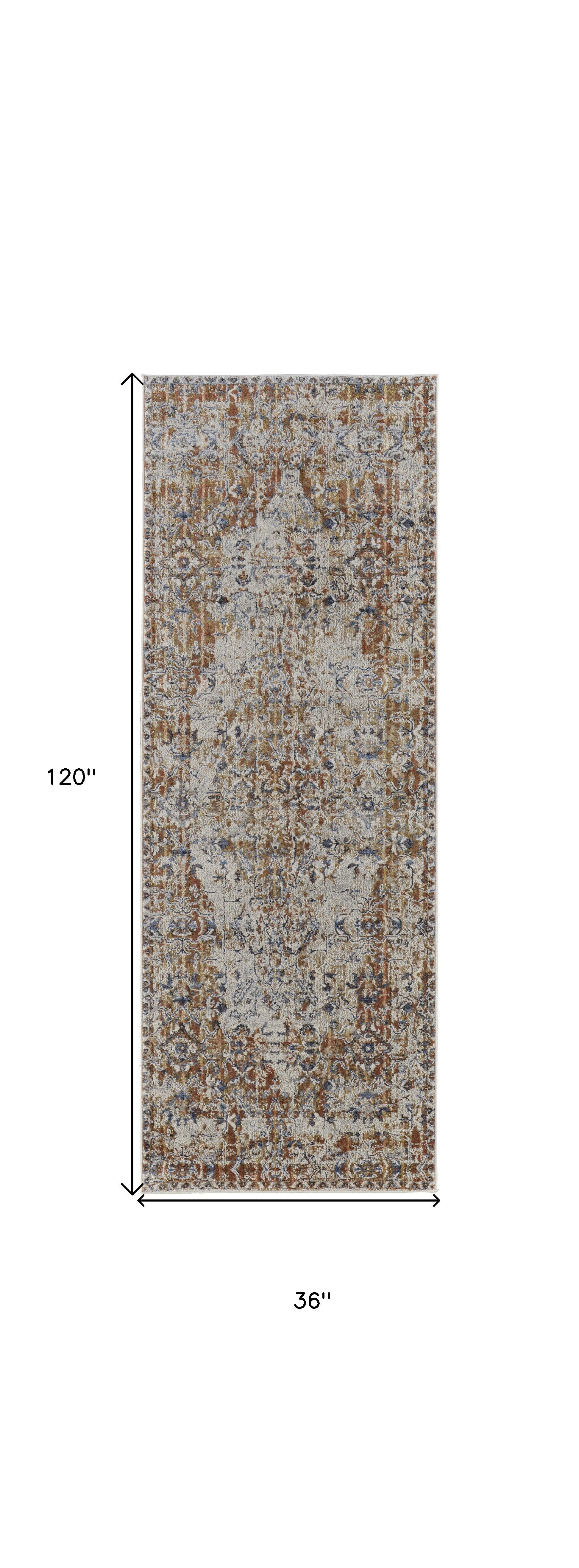 10' Tan Ivory And Orange Floral Power Loom Runner Rug With Fringe