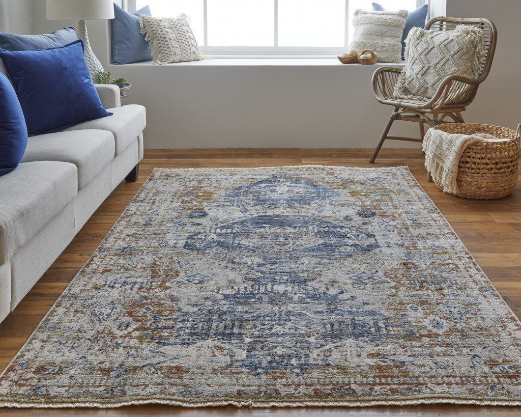 5' X 8' Ivory Orange And Blue Floral Power Loom Distressed Area Rug With Fringe