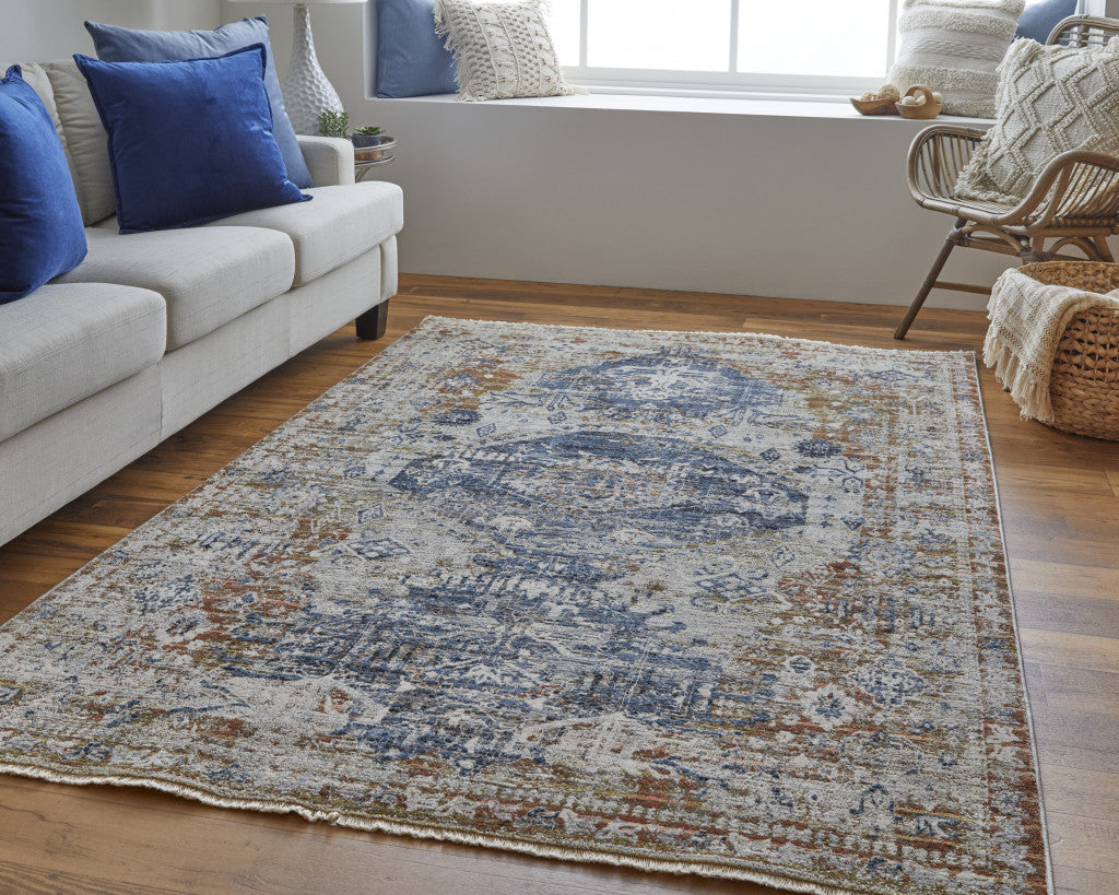 8' X 10' Ivory Orange And Blue Floral Power Loom Distressed Area Rug With Fringe