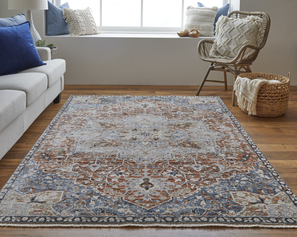 8' X 10' Orange Ivory And Blue Floral Power Loom Area Rug With Fringe