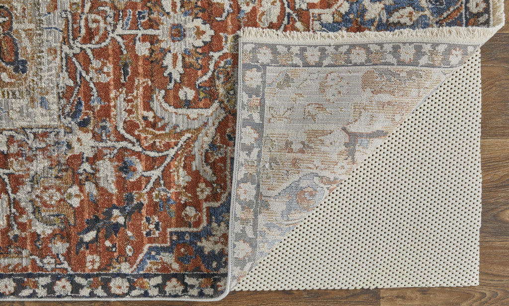 8' X 10' Orange Ivory And Blue Floral Power Loom Area Rug With Fringe